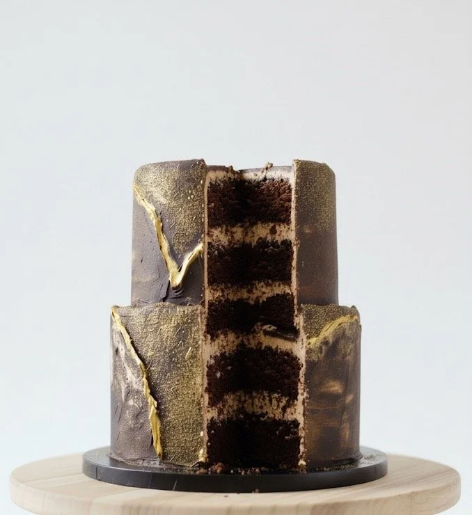 Luxury black and gold celebration cake baked fresh to order in Cambridge