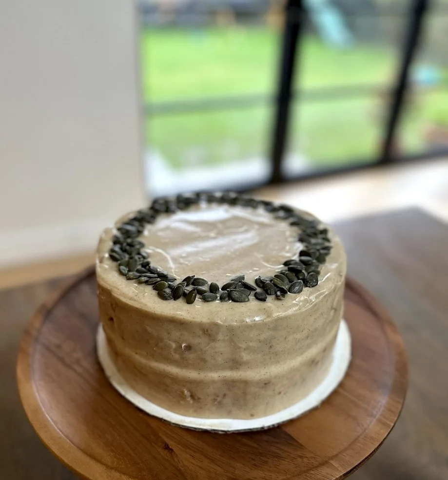 Vanilla pumpkin seed artisanal layered celebration cake Cambridge